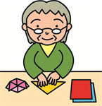 折り紙をする女性高齢者