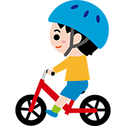 ヘルメットをして自転車に乗る幼児