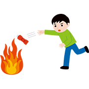 消火ボトルを投げ入れる人
