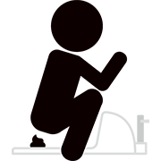 和式トイレを使用するピクト