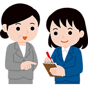 若手社員に教えるベテラン社員