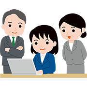 作業する若手社員を見守るベテラン社員