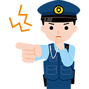 警笛を鳴らす警察官