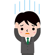 頭を抱えている若い男性