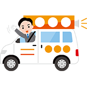 選挙カーから手を振っている候補者